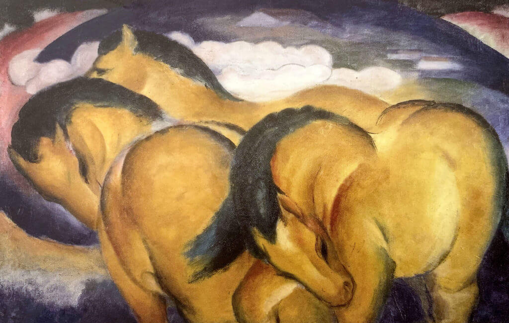 postcard front: three yellow horses